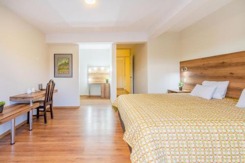 Katil atau katil-katil dalam bilik di Valles Apartamentos Ecológicos VAE - Urubamba Cusco Perú