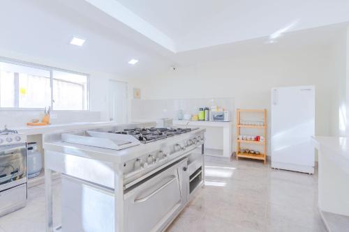 Dapur atau dapur kecil di Valles Apartamentos Ecológicos VAE - Urubamba Cusco Perú
