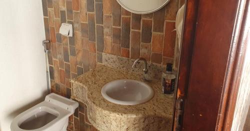 Koupelna v ubytování Casa de Temporada Uberaba com Piscina
