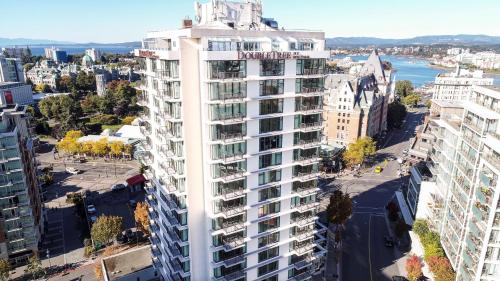 an aerial view of a tall white building at DoubleTree by Hilton Hotel & Suites Victoria in Victoria