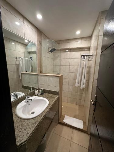 a bathroom with a sink and a shower at Villa Silia in Sharm El Sheikh