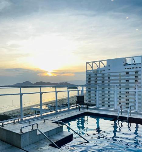 Πισίνα στο ή κοντά στο Flat vista mar em Santos