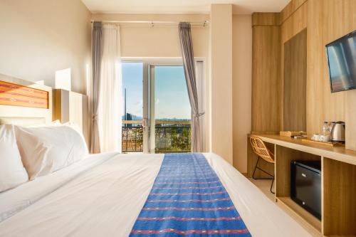Letto o letti in una camera di DEJAVU 2.0 HOTEL BAJO KOMODO