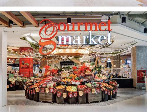 a supermarket market with a large display of fruits and vegetables at N Condominium in Ban Bang Khen (1)