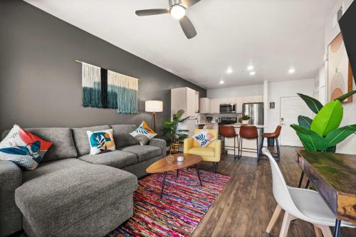 a living room with a couch and a table at Affordable APT in Salt Lake City Ideal Location in Salt Lake City