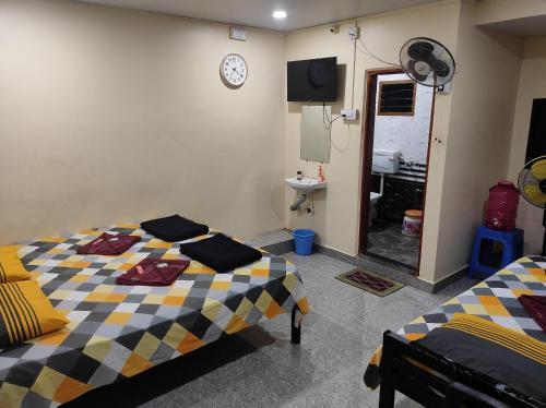 DANDELI CROCODILE EDGE HOME STAYにあるベッド