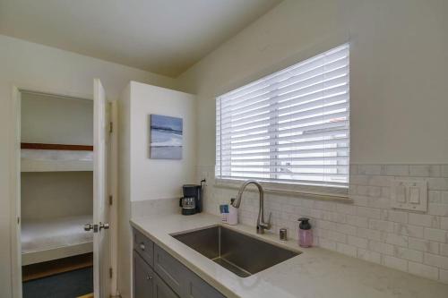 a kitchen with a sink and a window at Oceanbreeze - newly remodeled delightful oasis in the heart of Mission Beach, sleeps 6 in San Diego