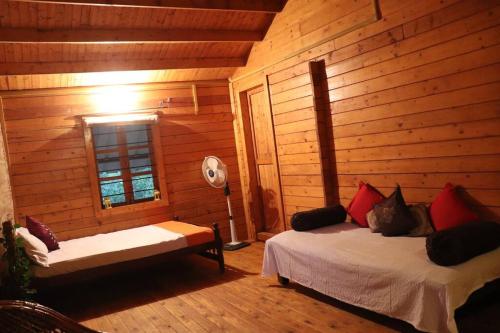 Fotografie z fotogalerie ubytování Coorg Northbreeze Wooden Stay v destinaci Madikeri
