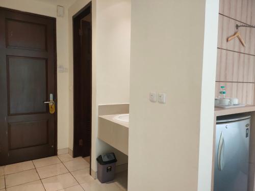 Kuchyň nebo kuchyňský kout v ubytování D'Bamboo Suites