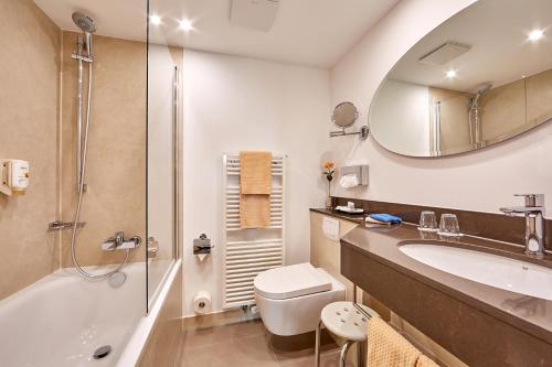 Ванная комната в Zum Turm - Apartments und Gästezimmer