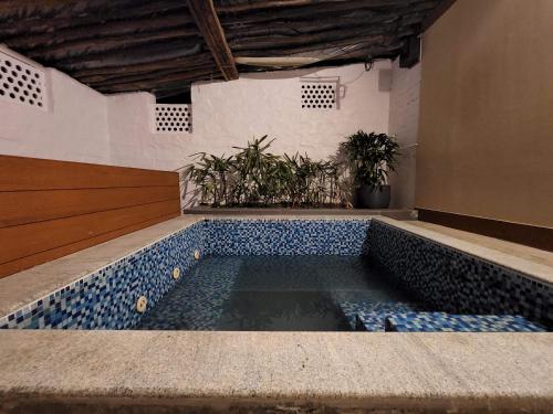 Piscina di Wild Orchid 5BHK Villa & Eco Cottages in Sancoale Valley o nelle vicinanze
