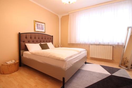 Katil atau katil-katil dalam bilik di Retro Apartment