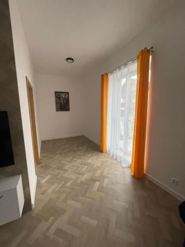 Una televisión o centro de entretenimiento en Apartmány Lucia