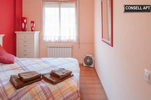 Lova arba lovos apgyvendinimo įstaigoje Apartment Consell de Cent