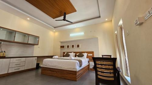 Postel nebo postele na pokoji v ubytování TIO -THE INDIAN ORIGIN HOTELS & RESORTS - Yercaud