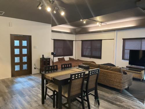 a living room with a table and a couch at casagrande in Koniya