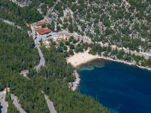 an aerial view of a beach next to a lake at Villa Apollo up to 8px, private pool in Fiskardho