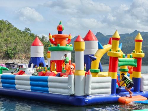 a inflatable water park on the water at เดอะวอเตอร์ปาร์ครีสอร์ท- The Water Park Resort in Ban Laem Mong Khoi