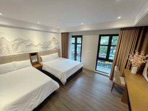 Postel nebo postele na pokoji v ubytování Trung Đức Homestay