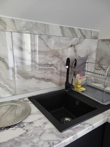 Η κουζίνα ή μικρή κουζίνα στο Maria City Apartament