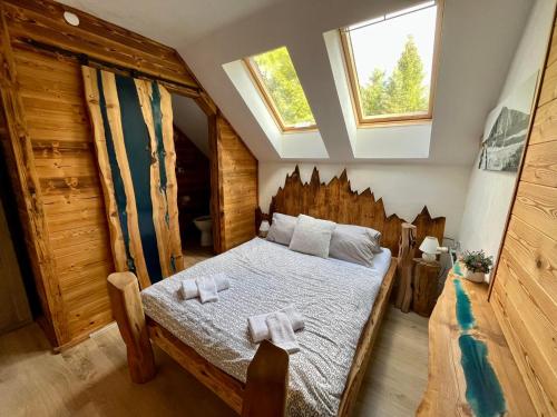 Postel nebo postele na pokoji v ubytování Penzion & Restaurant Pod Čerťákem