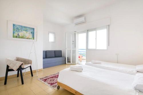 Postel nebo postele na pokoji v ubytování Beach Front Villa