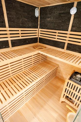 a room with four wooden bunk beds in it at Bernstein Schlosshotel Ballenstedt in Ballenstedt