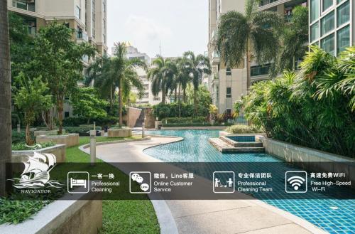 a view of a swimming pool in a building at Rama9 Luxe Suites in Bangkok