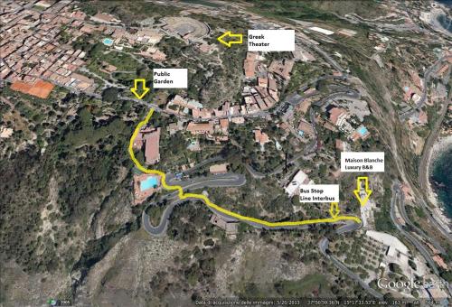 a map of a road with yellow arrows at Maison Blanche Taormina in Taormina