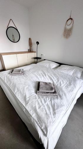 Postel nebo postele na pokoji v ubytování PrivLike apartment