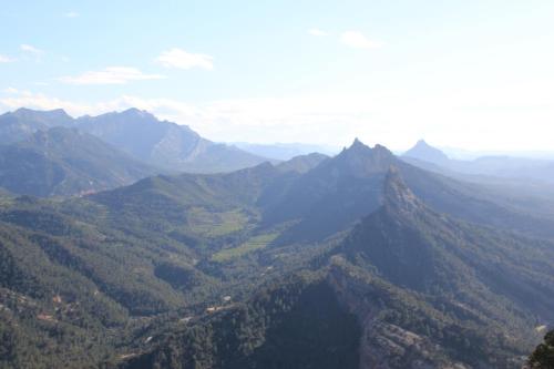 a view of a mountain valley with trees and mountains at Ca La Leonor, Ecoturisme Terra Alta in Bot