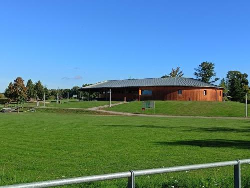 a large building in the middle of a field at Chalupa u Mikeše in Žďár nad Sázavou