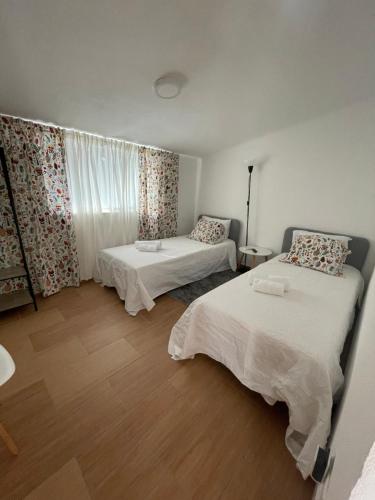 Säng eller sängar i ett rum på Refúgio da Póvoa