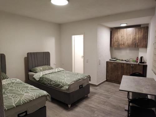 Ένα ή περισσότερα κρεβάτια σε δωμάτιο στο Heidenheimer Zimmer