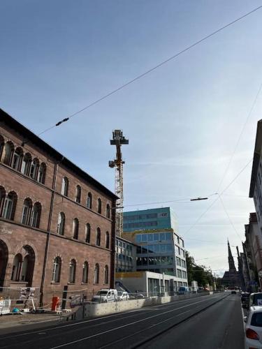 an empty street in front of a building at City Appartement direkt am Schloss! in Karlsruhe