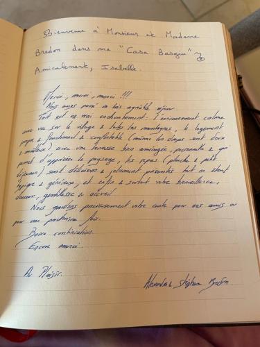 a letter from politician in a book at Casa Basgiu, chambres avec balcon in Zilia