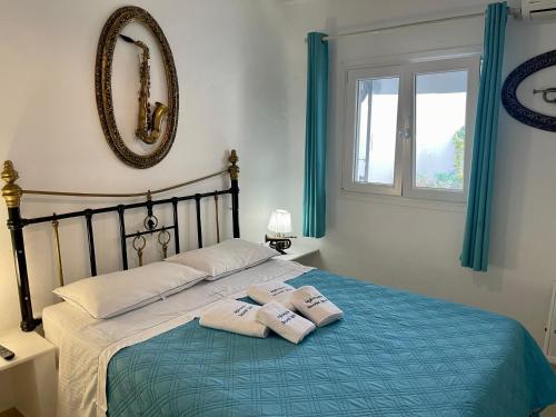 Posteľ alebo postele v izbe v ubytovaní Mykonos Secret Spot