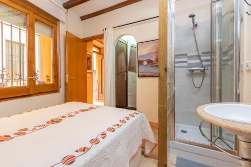 a bathroom with a shower and a sink at Dana in Palamós