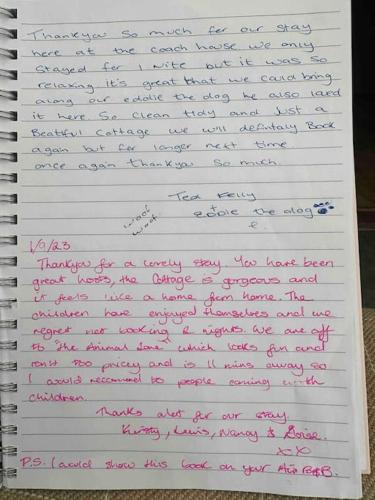 a letter written in pink and purple handwriting at The Hurst Coach House in Stafford
