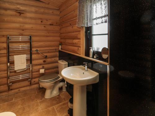 Koupelna v ubytování Welcome Hjem Log Cabin
