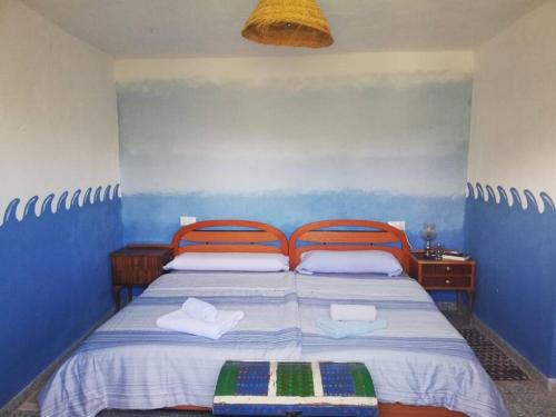 Postel nebo postele na pokoji v ubytování Casa Diafa