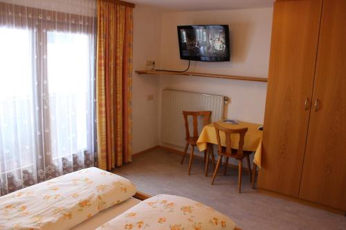 Letto o letti in una camera di Haus Christian