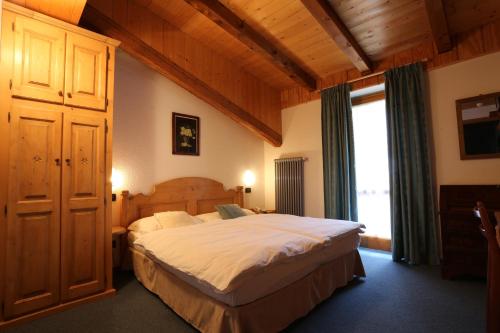Postel nebo postele na pokoji v ubytování Albergo Centrale