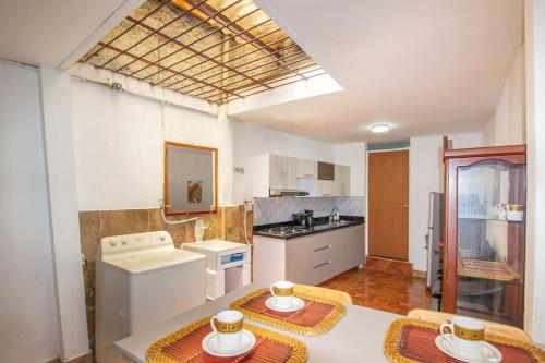 Kuchyňa alebo kuchynka v ubytovaní ¡casa con parqueadero! Hogareña y vacacional