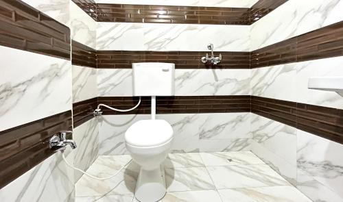 A bathroom at Bhanwar Vila by Premier Hotels