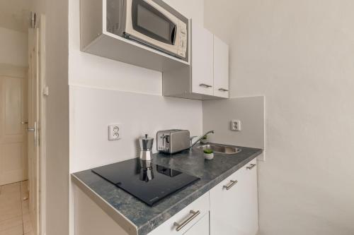 Dapur atau dapur kecil di King´s Road Residence