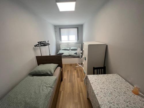 Ένα ή περισσότερα κρεβάτια σε δωμάτιο στο Maláta Homes