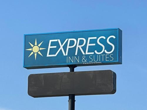 a street sign for the express inn and suites at Express inn Junction city in Junction City