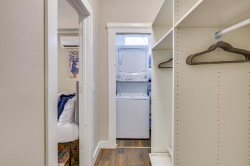 a walk in closet with a washer and dryer at Downtown Wilmington Studio - Pets Welcome! in Wilmington