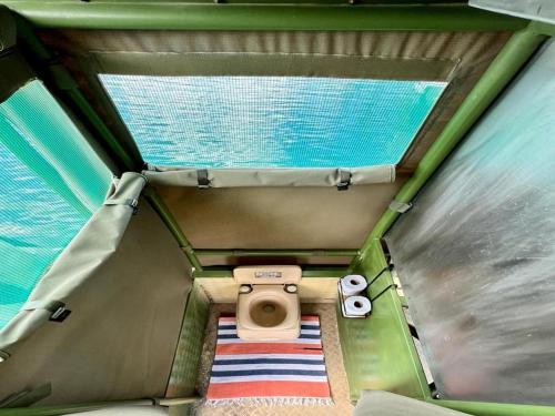 an overhead view of a bathroom with a toilet at Kazondwe Camp and Lodge in Kongola